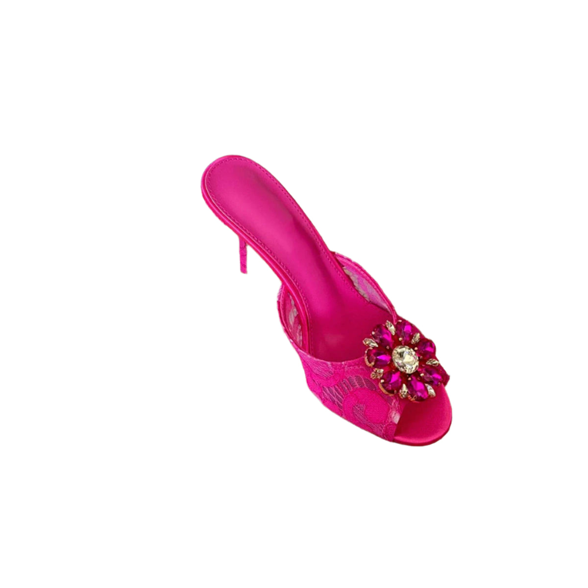 Pink sandal with a decorative flower on a woven surface